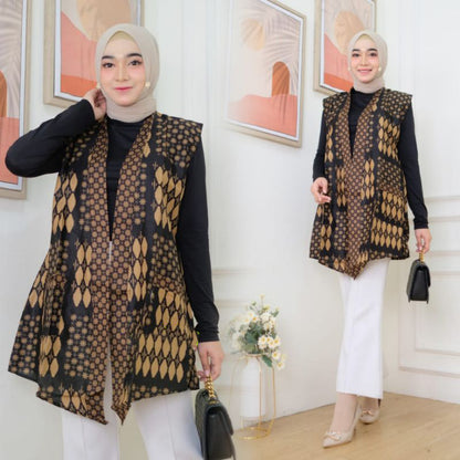 Het eigentijdse batik-buitenvest is de bovenkleding voor dames van Sogan
